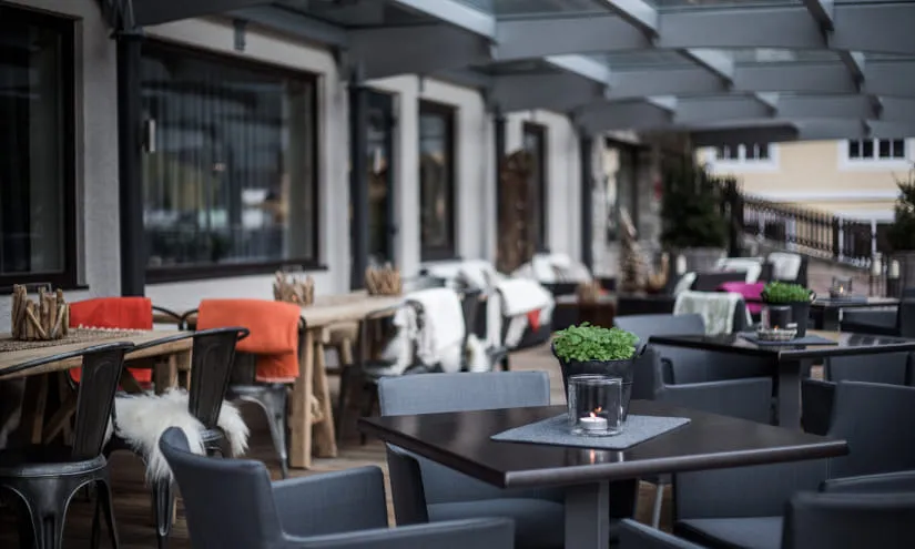 Terrace of THOMSN Alpiner Rock Hotel, cozy seating options