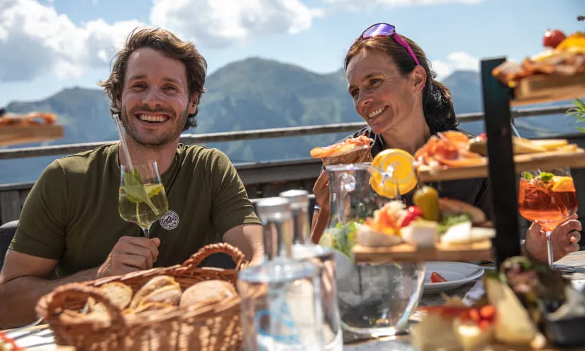 People enjoying food and drinks in Saalbach